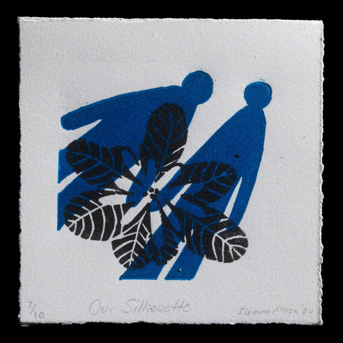 This linocut print features a striking blue silhouette of two figures surrounded by black leaves on a white background, titled 'Our Silhouette' by Ileana Maza. The relief print showcases the artist's unique perspective and skill in using contrasting colors to create depth and dimensionality.