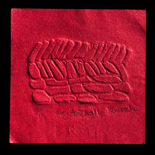 This print, "Dry Stone Wall" by Bonnie Laverock, features a blind embossed design in shades of red against a black background.