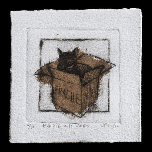 This print, titled "Fragile" by JPringle, showcases a cat nestled in a cardboard box with a 'fragile' label, rendered using drypoint and chine-coll� techniques. The monochrome palette features warm tones of brown and grey, accentuated by subtle texture and expressive line work that draws attention to the feline figure within the simple composition.
