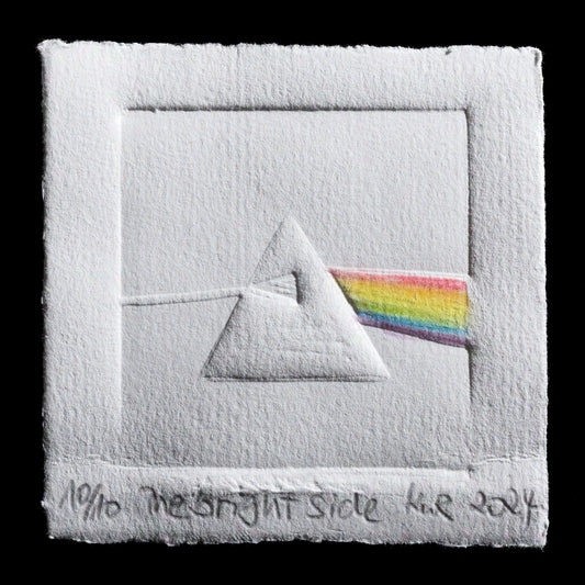This print, "The Bright Side" by kwr_handmade, showcases a striking blind embossed design featuring a rainbow-colored prism, reminiscent of Pink Floyd's iconic album cover art.