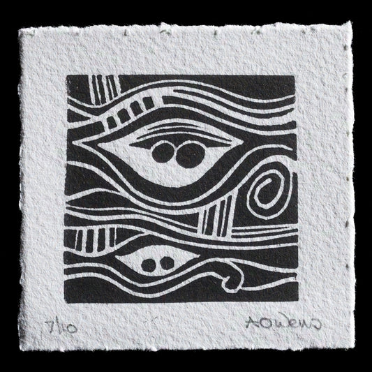 This linocut print, titled "Oceans" by AnnMarie Owens, features a captivating abstract composition with flowing lines that evoke the dynamic movement of ocean waves. The monochromatic palette showcases various shades of gray, adding depth and texture to the intricate design.