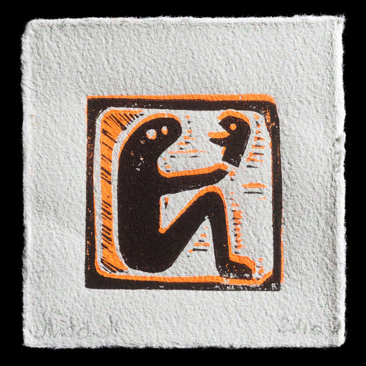 This linocut print by Joanna Mitchell features a stylized figure in black, holding another figure's head to their chest, set against an orange background with a gray border. The artwork is titled 'the only truth is your own', showcasing the artist's unique style and technique.