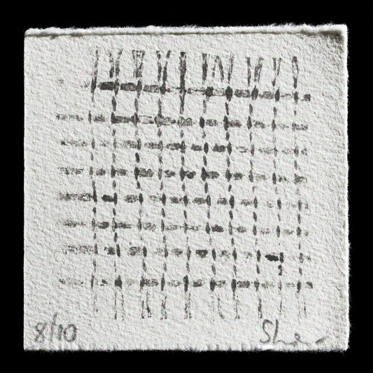 This monotype print, 'Detritus', is a striking visual representation by Sherrill Harvey. Characterized by its intricate grid-like pattern, the print features a predominantly white background with subtle black accents. The artist's use of monotype technique imbues the piece with a sense of spontaneity and fluidity, while the grid structure adds a layer of precision and order.