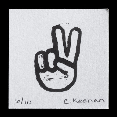 This black-and-white print showcases a stylized hand gesture, evoking the iconic 