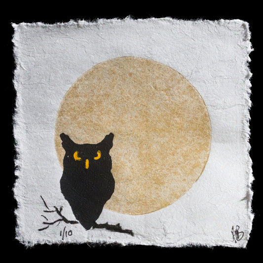 This artwork features an owl perched in front of a large moon, rendered in muted tones with a black background. The image showcases the artist's use of linocut techniques and 3D printed plate methods to create the intricate details and textures visible in the print. The overall effect is one of subtle contrast between light and dark, evoking an atmosphere of quiet contemplation.