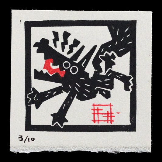 This captivating print, "Small Wolf" by Ilya Yudovski, showcases a wolf in black silhouette with red highlights, set against a white background. The composition is framed by a thick black border, creating a striking visual effect. A signature in red accompanies the artwork, adding an element of authenticity.