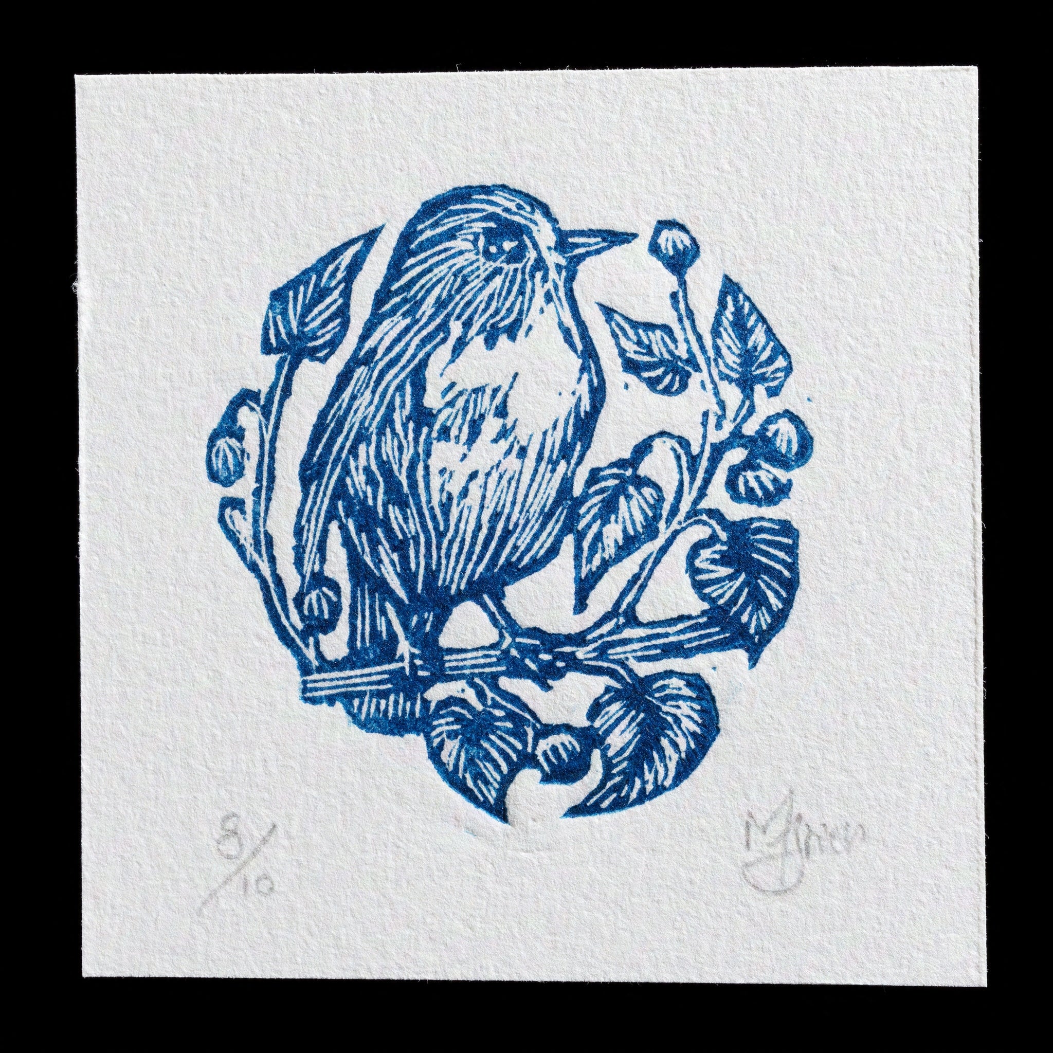 The image features a serene blue-toned woodcut print from artist Marc Itier, titled 'Untitled'. A delicate bird perches gracefully within an intricate arrangement of leaves and branches, its gaze directed towards the left side of the artwork. The composition is set against a crisp white background, with subtle shading adding depth to the design.