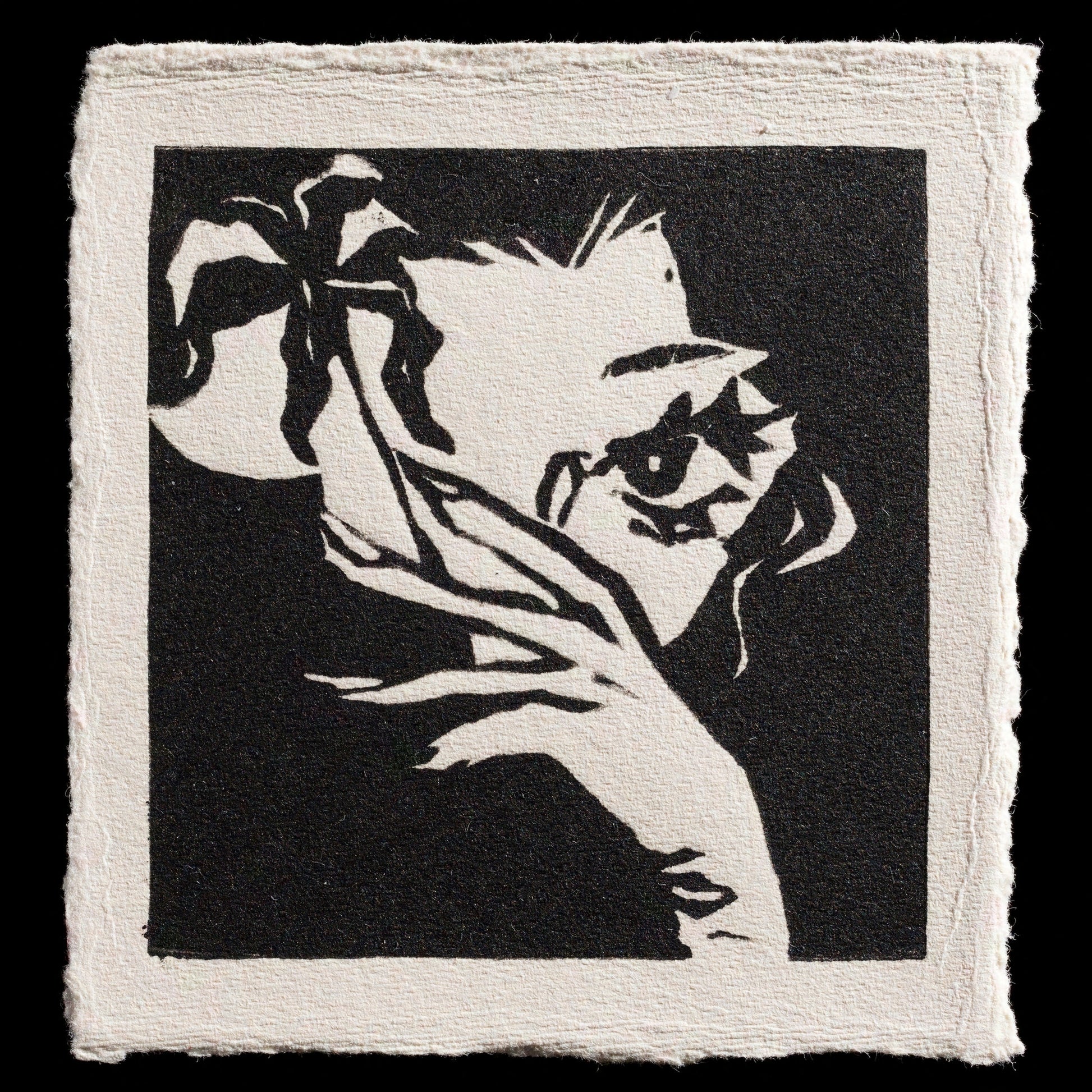 This captivating print, "Hanasaku" by KuraH, is a stunning example of linocut artistry. Created using black ink on white paper, it features an abstract woman's face with closed eyes and a subtle smile, surrounded by lush greenery. The bold lines and expressive brushwork evoke a sense of serenity and tranquility.