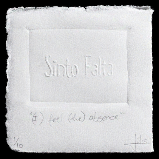 This print titled '(I) feel (the) absence' by Julia Franceschi Guerra features a white paper background with embossed text in the center that reads 'Sinto Falta', surrounded by a blank space. The artist's signature and edition number are visible in the bottom right corner. The print is characterized by its minimalist design, focusing on the subtle contrast between the embossed text and the plain white background.