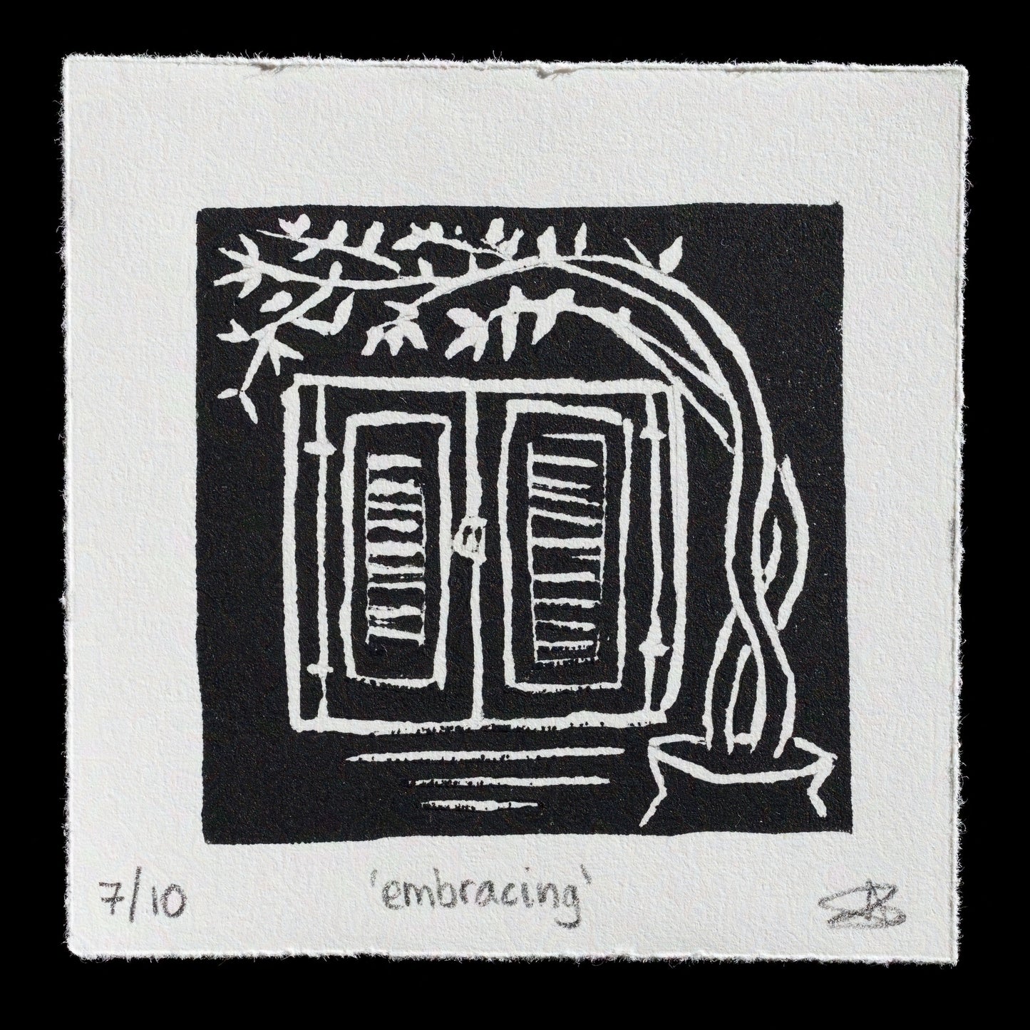 This print, titled "Embracing" by Antigoni Vlachou, features a striking black-and-white linocut technique. The composition showcases a window with open shutters, surrounded by lush greenery, creating an inviting and serene atmosphere.