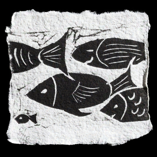 This print, titled "Fish don't sweat" by Luigina, showcases a linocut on handmade paper featuring four fish in black against a white background. The title is not explicitly visible within the artwork itself.