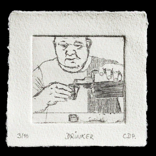 This print, titled "Drinker" by Claudia Drachsler-Prassler, is an etched work showcasing a detailed sketch of a man enjoying a drink. The monochromatic color palette features dark grey tones on off-white paper, with the artist's signature visible in the bottom right corner.