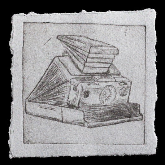 This print, titled "SX-70" by Melissa Jaarsma, showcases the artist's exploration of drypoint technique. The monochromatic color palette features a range of grays, with subtle texture and shading creating depth and dimensionality in the subject matter.