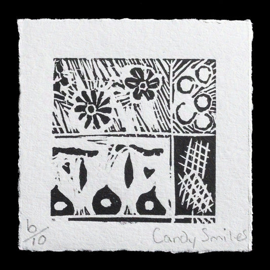 This captivating linocut print, titled "Garden" by Candy Smiles, showcases a harmonious arrangement of flowers, leaves, and other botanical elements in shades of green and brown. The artist's skilled use of texture and pattern creates a visually appealing piece that invites the viewer to explore its intricate details.