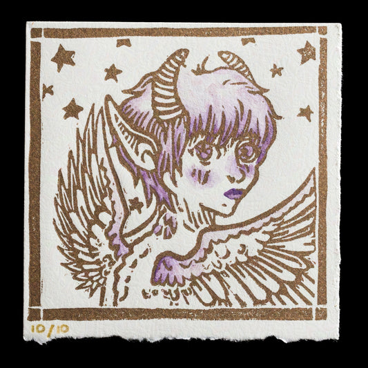 This print, titled 'Starstruck', features a linocut illustration of a winged creature in shades of purple and brown set against a white background with gold stars and borders. The artwork showcases intricate details and textures characteristic of relief printing techniques.