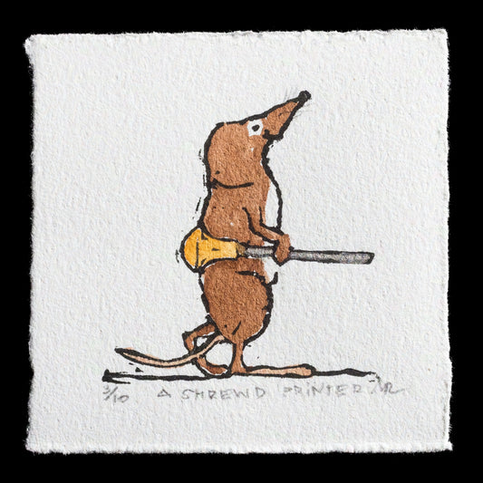 The image features a whimsical linocut print by Mary Romanuck, showcasing a small mouse dressed as a printer, holding a tool and wearing a yellow apron. The artwork is rendered in warm brown tones with subtle touches of white and gray, set against a crisp white background.