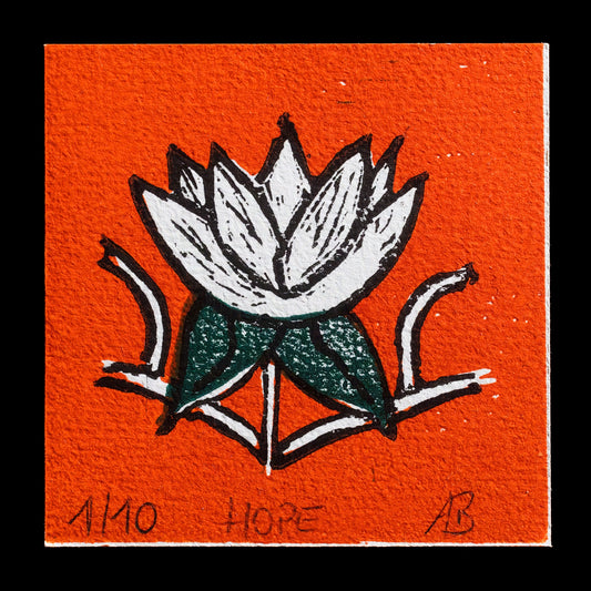 This captivating linocut print, titled "Hope," features a striking white flower with dark green leaves against an orange background.