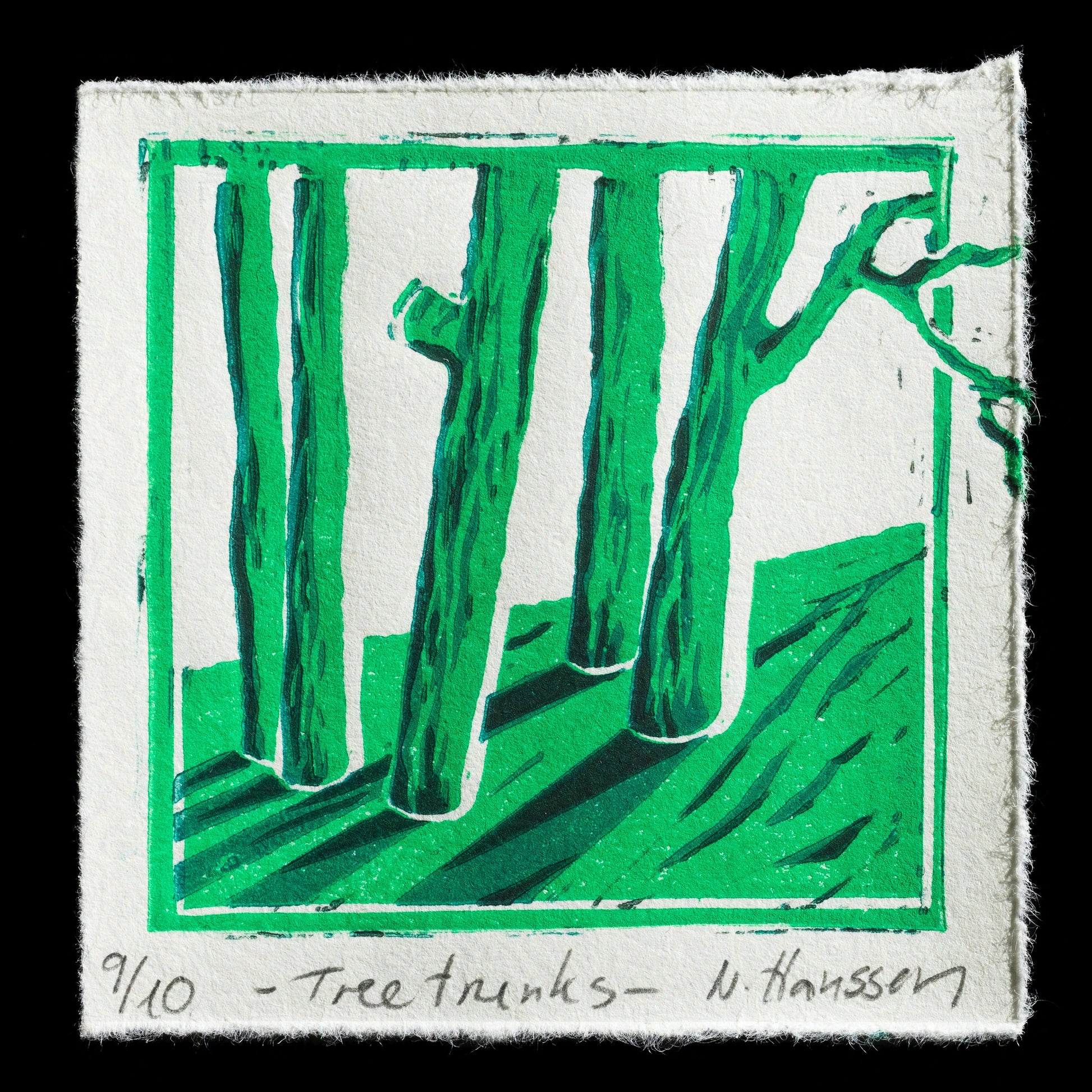 This linocut print by Nadine Hanssen features a stylized depiction of tree trunks set against a white background. The design showcases six vertical trunks with varying widths and heights, arranged in two rows of three, accompanied by a smaller trunk on the right side. A thin green border frames the trees, which are rendered in shades of green that range from light to dark.