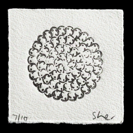 This print, titled "Mandala" by Sherrill Harvey, is a monotype artwork featuring a circular design with intricate patterns and lines in shades of gray against a white background. The subtle color palette and detailed composition showcase the artist's skillful use of monotype techniques.
