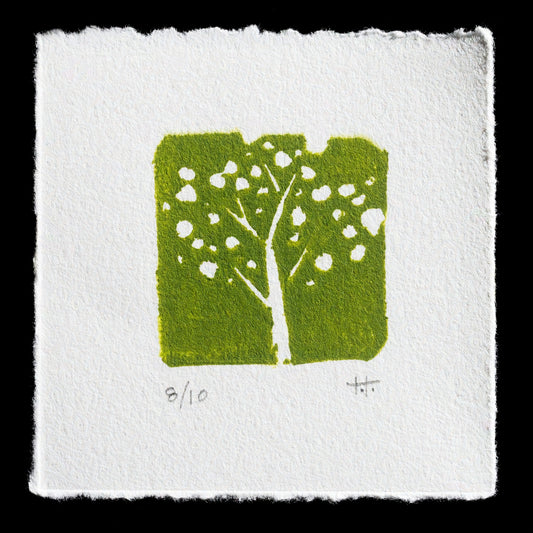 Here is a concise SEO description for the print:

"Tree of Light", a captivating relief print by Teresa Tonai, showcases a serene tree motif in vibrant green hues against a white background. The intricate design exudes tranquility and natural beauty.