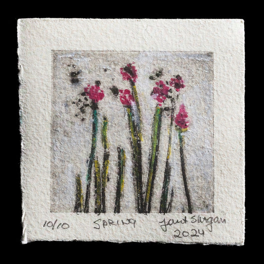 This captivating drypoint print by Janet Yagoda Shagam, titled 'Spring Flowers,' showcases delicate pink blooms set against a subtle gray background, evoking the essence of springtime. The artist's use of soft coloration and gentle composition creates a serene and inviting atmosphere, drawing viewers into the tranquil world of her artwork.