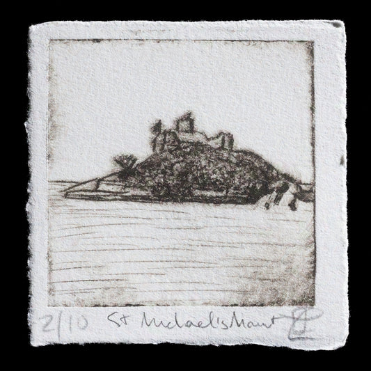 This etching print, titled "St Michael's Mount" by Elizabeth Lovegrove, presents a serene landscape featuring St Michael's Mount in Cornwall, England. The artist employs intaglio and drypoint techniques to achieve a rich texture, with deep blacks used for the mountainous terrain and lighter tones for the sky and water. A subtle signature appears at the bottom of the print.
