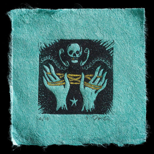 This captivating print, "Party Line," by artist Stacie Dolin, showcases a unique blend of linocut techniques with a striking color palette.

**Key Features:**

* A skull with headphones
* Two hands tied together, symbolizing connection and unity

**Color Scheme:**
The print features a harmonious combination of turquoise, black, gold, and white hues.