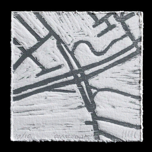 This captivating woodcut print, 'Crossroads', is a testament to Mary Hardy's skillful craftsmanship. The monochromatic palette features a striking gray tone that dominates the composition, with subtle hints of white adding depth and texture. A central intersection, comprising four bold lines, forms the focal point of the piece, while the surrounding areas are characterized by gentle waves and undulating patterns.