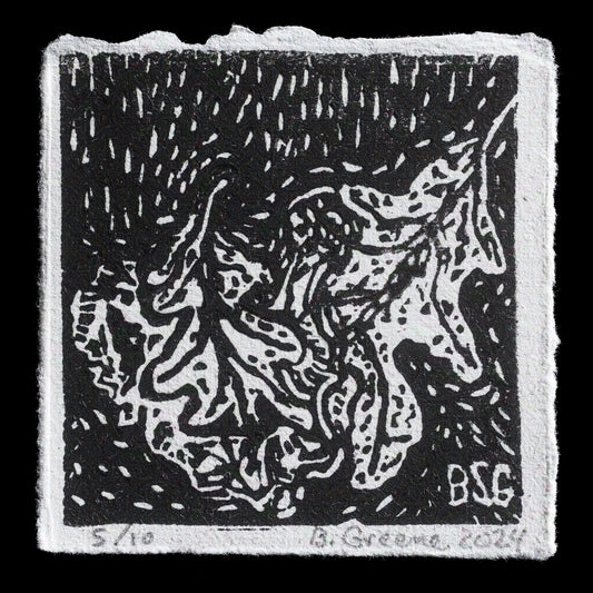 This linocut print, titled "Leaves & Mushroom" by Barbara Greene, features a detailed depiction of leaves and mushroom stems in shades of brown against a grayish background, showcasing intricate texture and detail.
