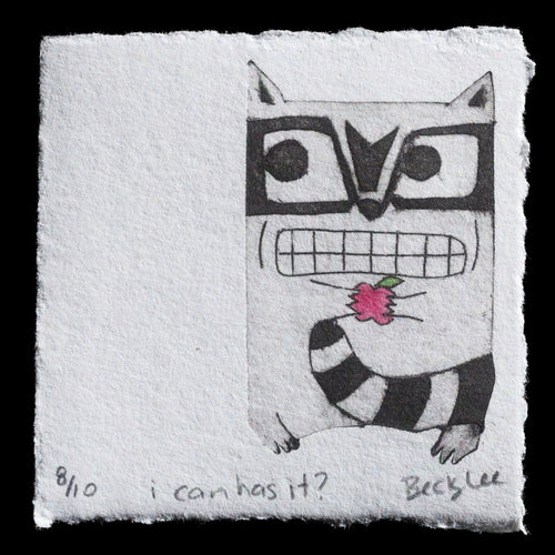 This print, titled 'i can has it?' by Becky Lee, showcases a stylized raccoon design created using intaglio, drypoint, TetraPak, and watercolor techniques. The image features a black-and-white raccoon with distinctive markings and a pink flower in its mouth, set against a light gray background.