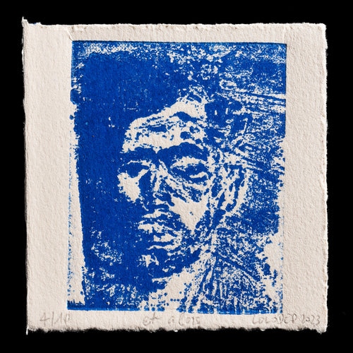 The image depicts a print titled 'Et alors' by artist Lolodep, created through the techniques of monoprint and wood engraving. The print features a blue face in front of a blue background, with visible texture and edges.