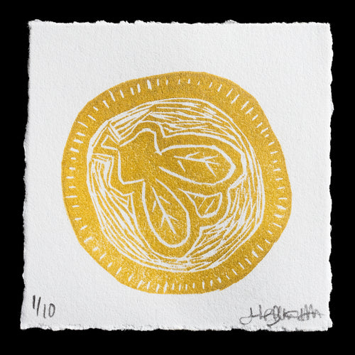 The image features a linocut print of a circular yellow design with white lines radiating from its center. The print has been torn at the edges to give it an aged look.

**Title:** 