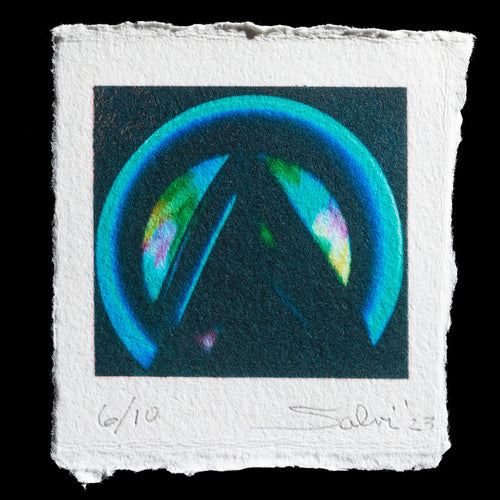 This captivating print by John Salvi is titled 'Eye of Providence'. Created through the techniques of etching and aquatint, it features a striking blue-green circle with a subtle rainbow effect, set against a deep black background. The artist's signature and edition number ('6/10') are discreetly inscribed at the bottom edge in pencil.